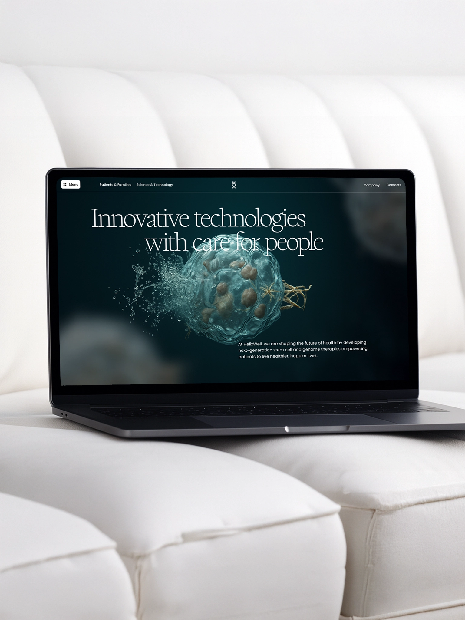 Laptop on white sofa showing the helixwell website