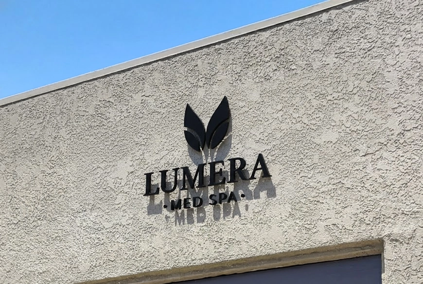 Exterior signage of Lumera Med Spa with brand logo